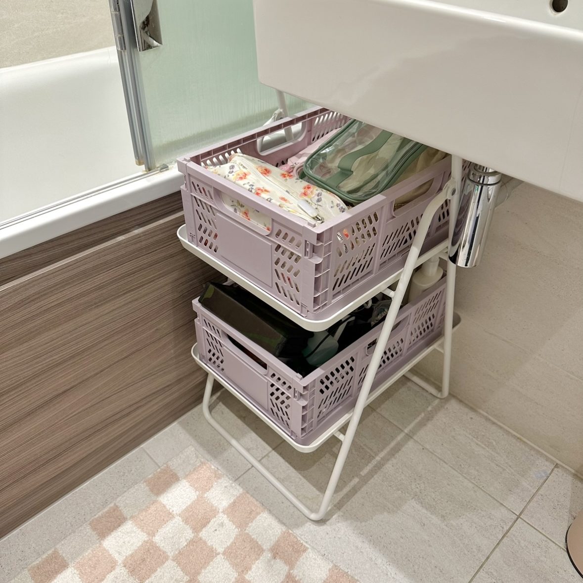 Storage crates under sink.